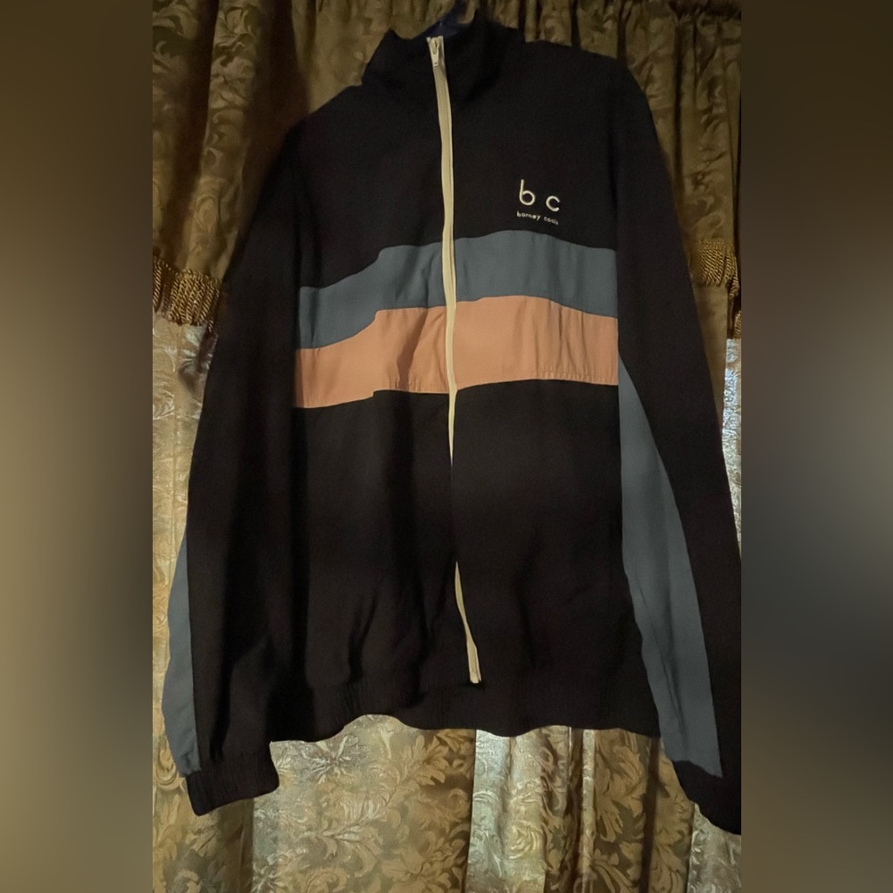 Good condition multi color - pastel pink, blue, and black.